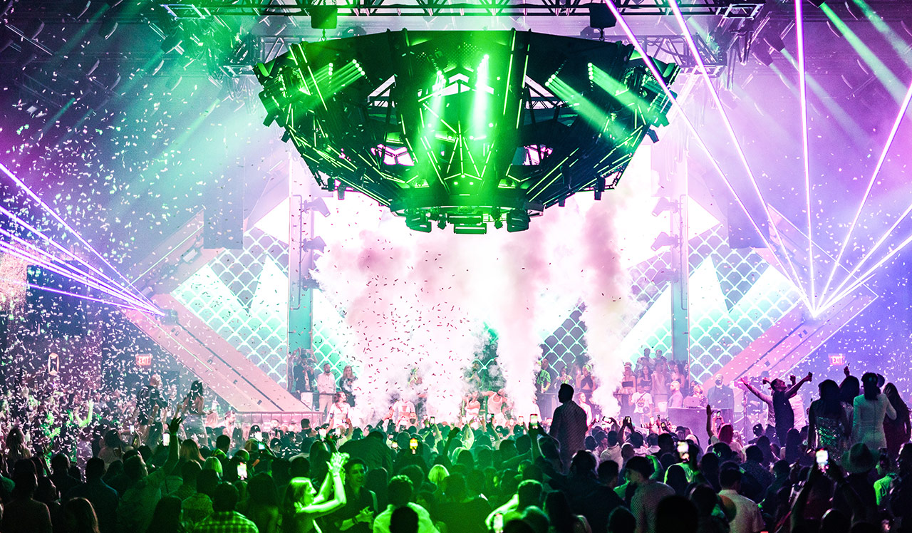 Zouk Las Vegas interior dance floor with massive LED mothership lighting fixture and crowd during a performance