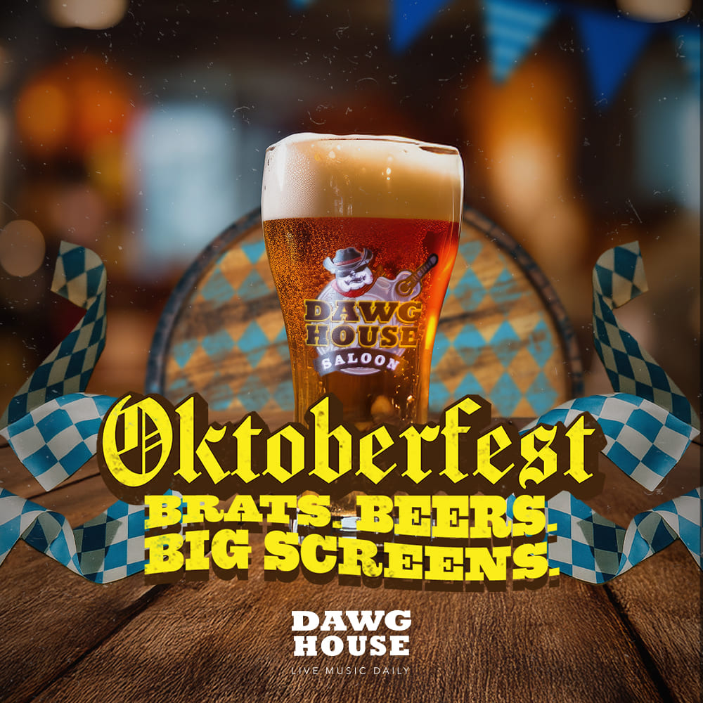 Pint of beer on a wooden table with blue checkered ribbons and Oktoberfest decorations